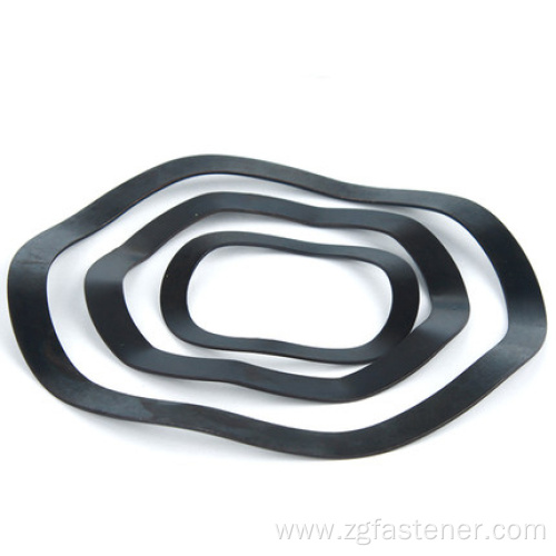 Black oxide plastic wave spring washers